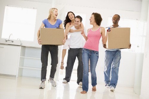 Removal van and movers preparing a house removal in Catford