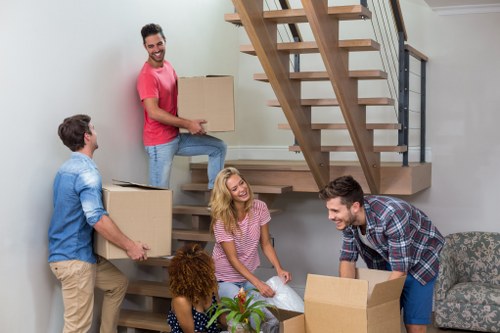 Careful packing of fragile items during a Catford relocation service