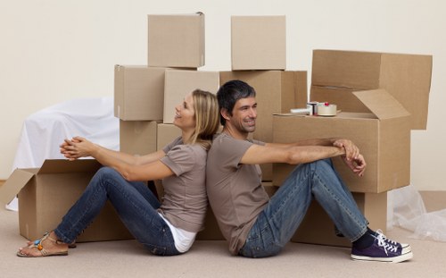 Professional removals team protecting furniture and property during transit