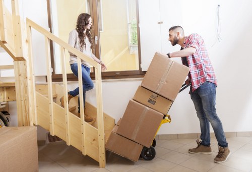 Stacked storage boxes and packing supplies for Catford relocation and storage
